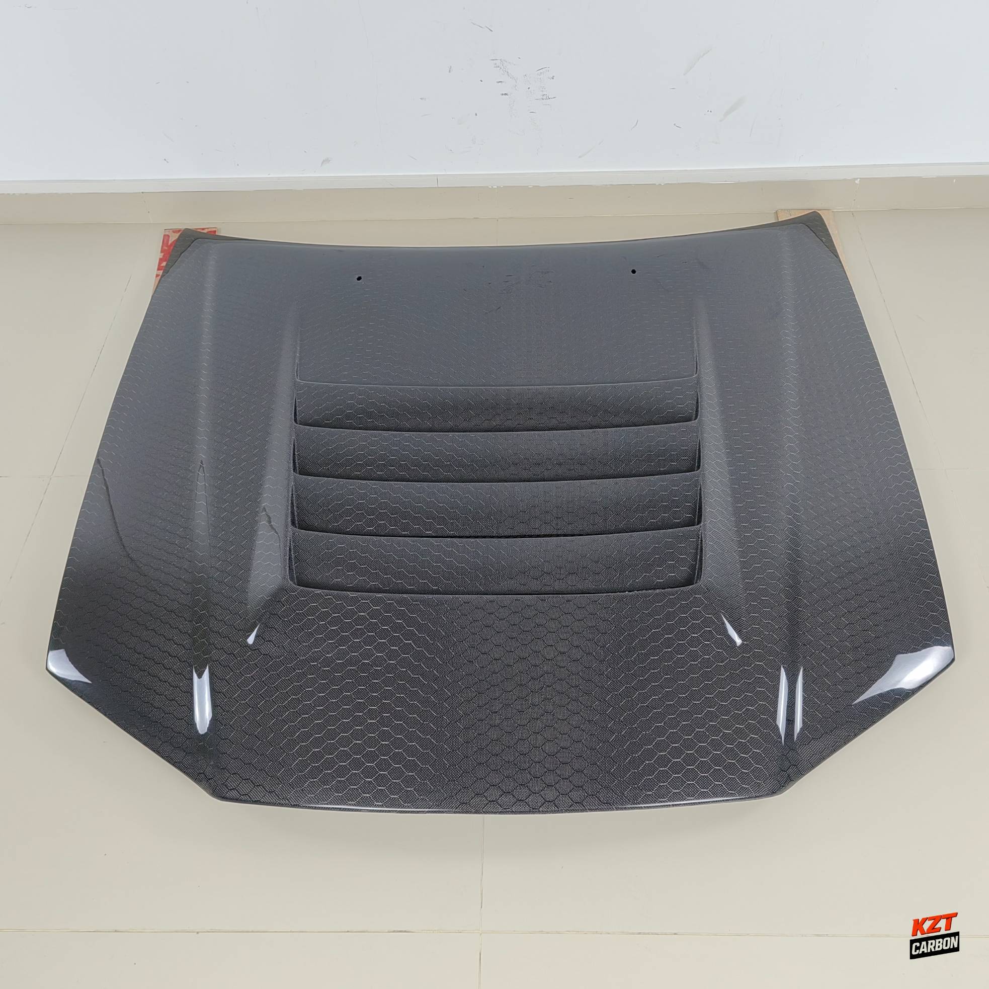 For Nissan Skyline R34 (GTR Only) NIS Style Honeycomb Carbon Front Vented Hood