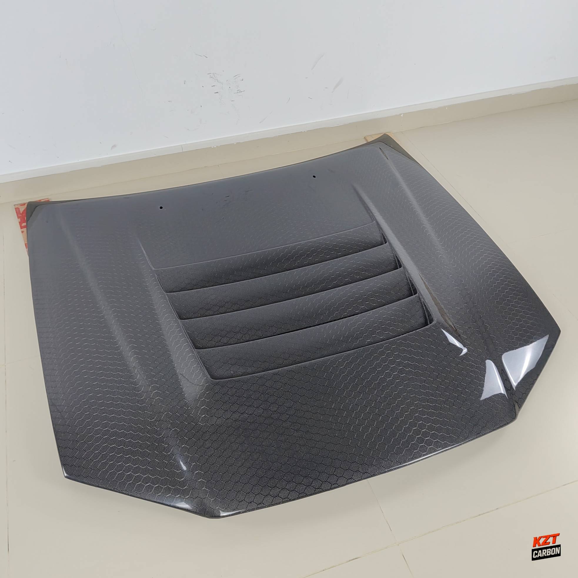 For Nissan Skyline R34 (GTR Only) NIS Style Honeycomb Carbon Front Vented Hood