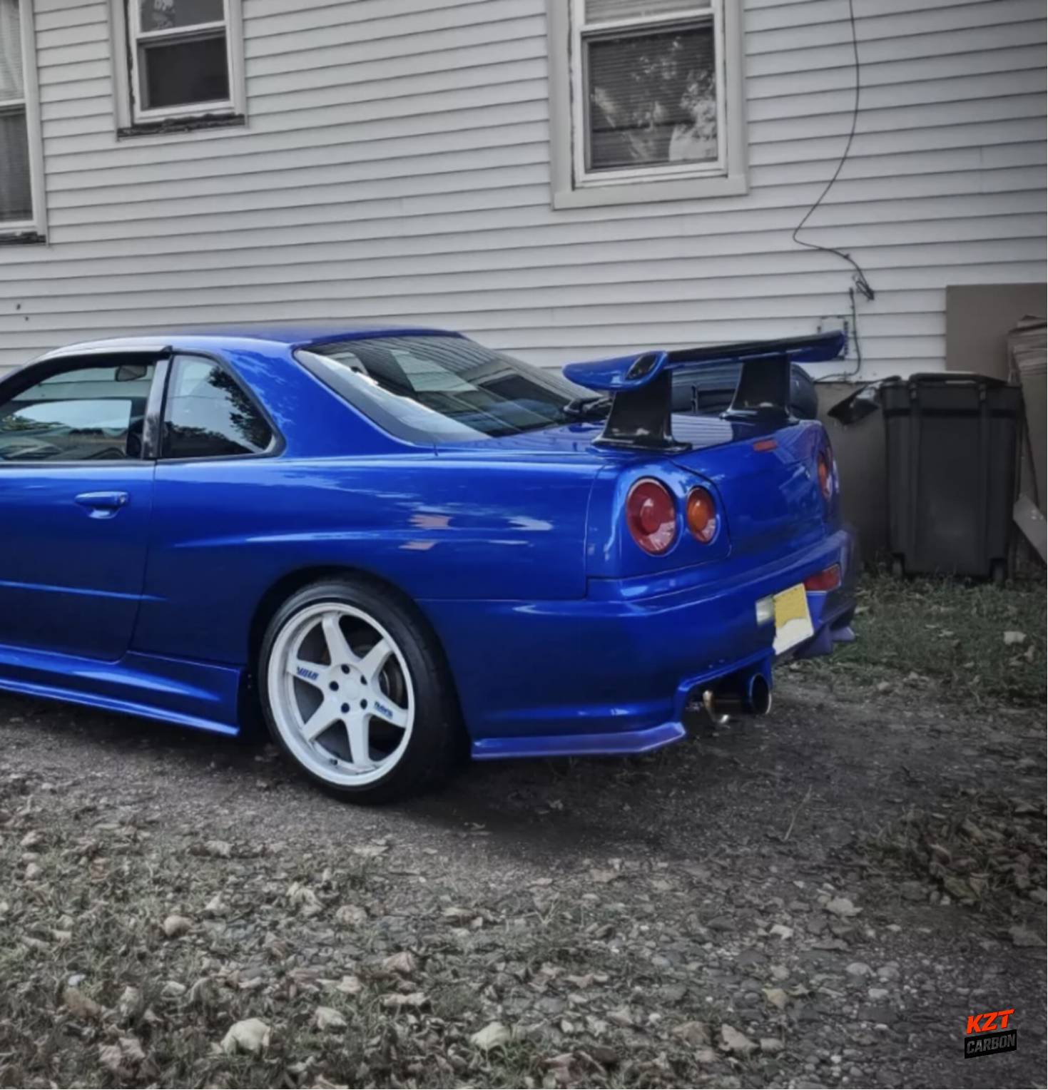 For Nissan Skyline R34 GTR OEM Spoiler with JUN High Spoiler Leg Partial Carbon Fiber (blade+caps)