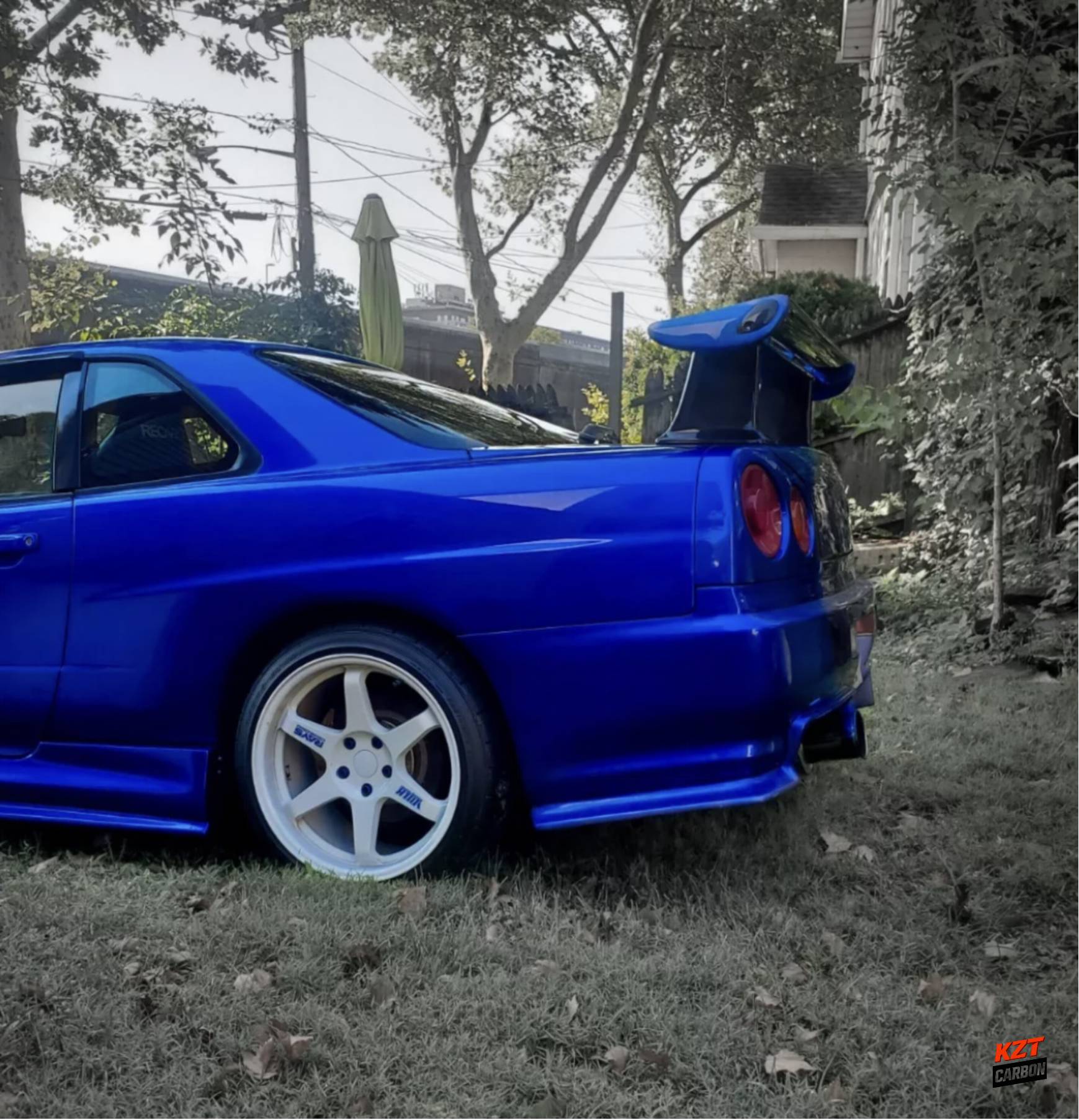 For Nissan Skyline R34 GTR OEM Spoiler with JUN High Spoiler Leg Partial Carbon Fiber (blade+caps)